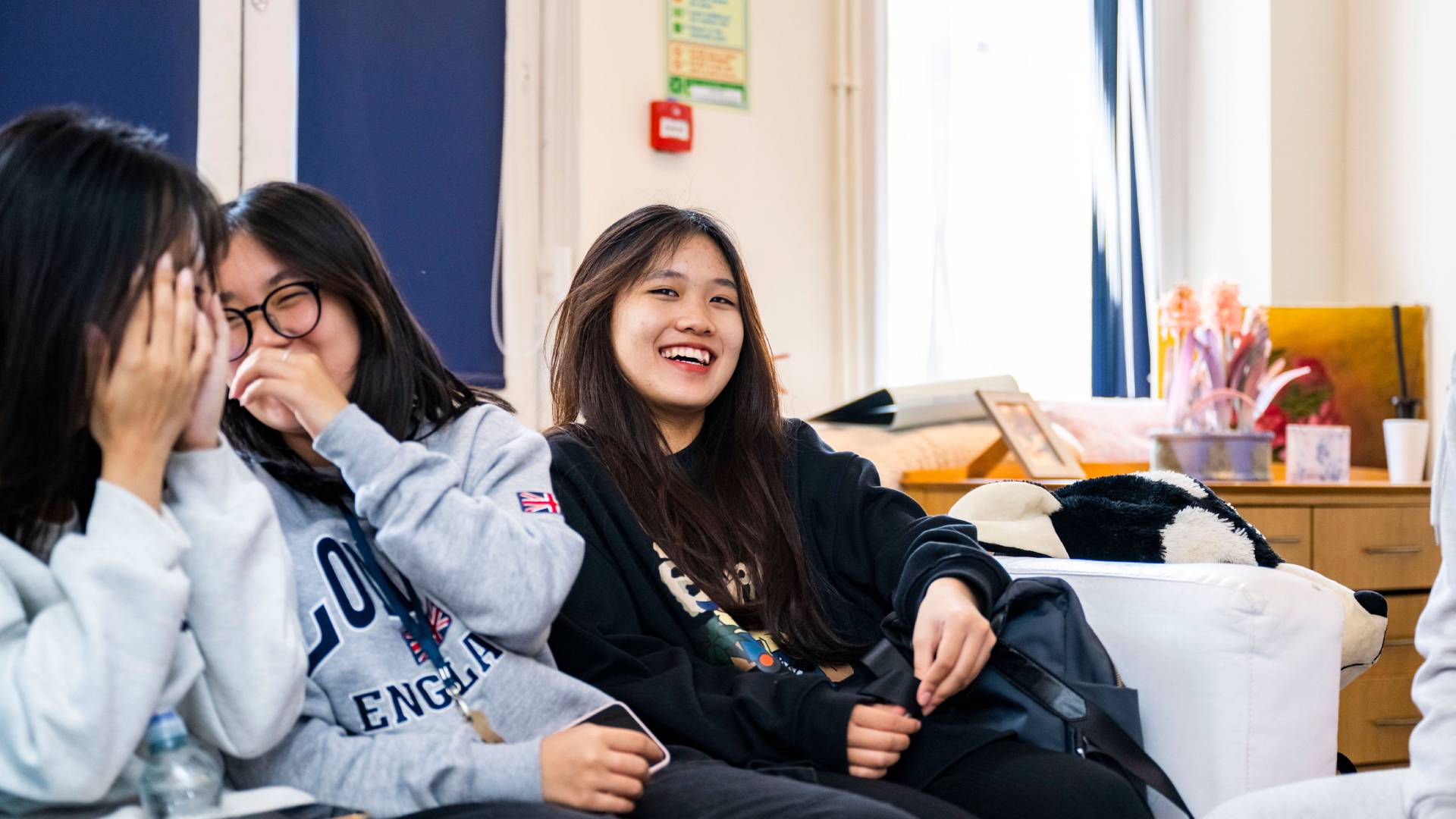 Boarding upper school students in their common room.